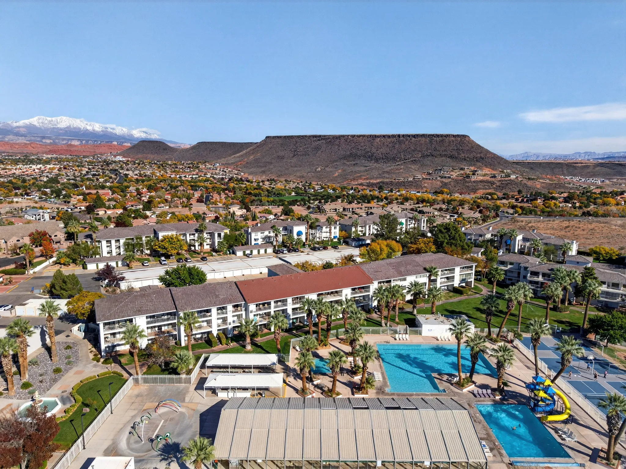 Bird's eye view of mountains and a pool