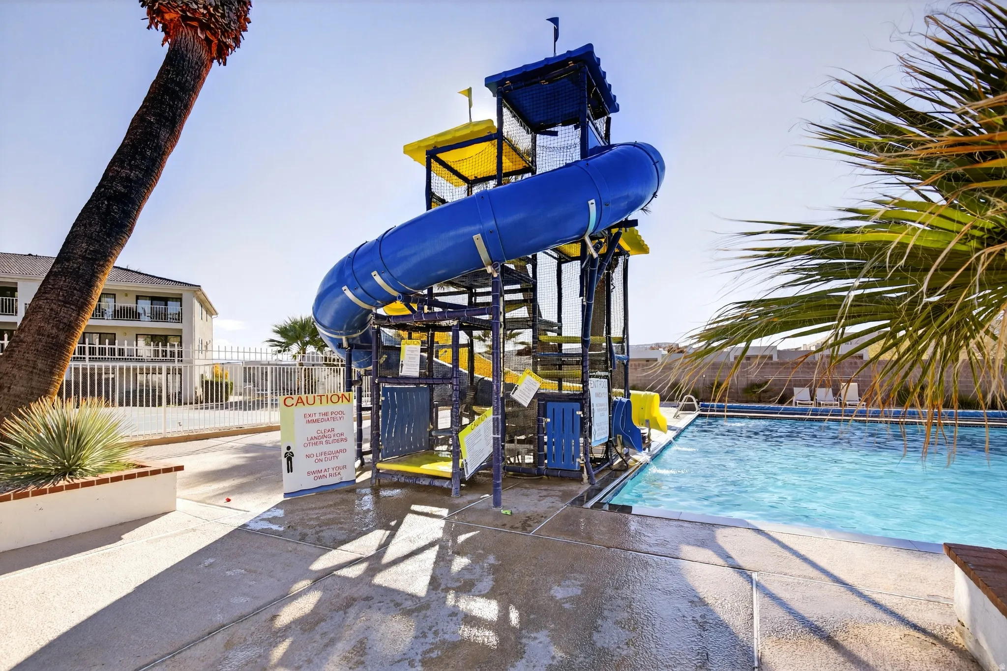 View of property's community with a swimming pool