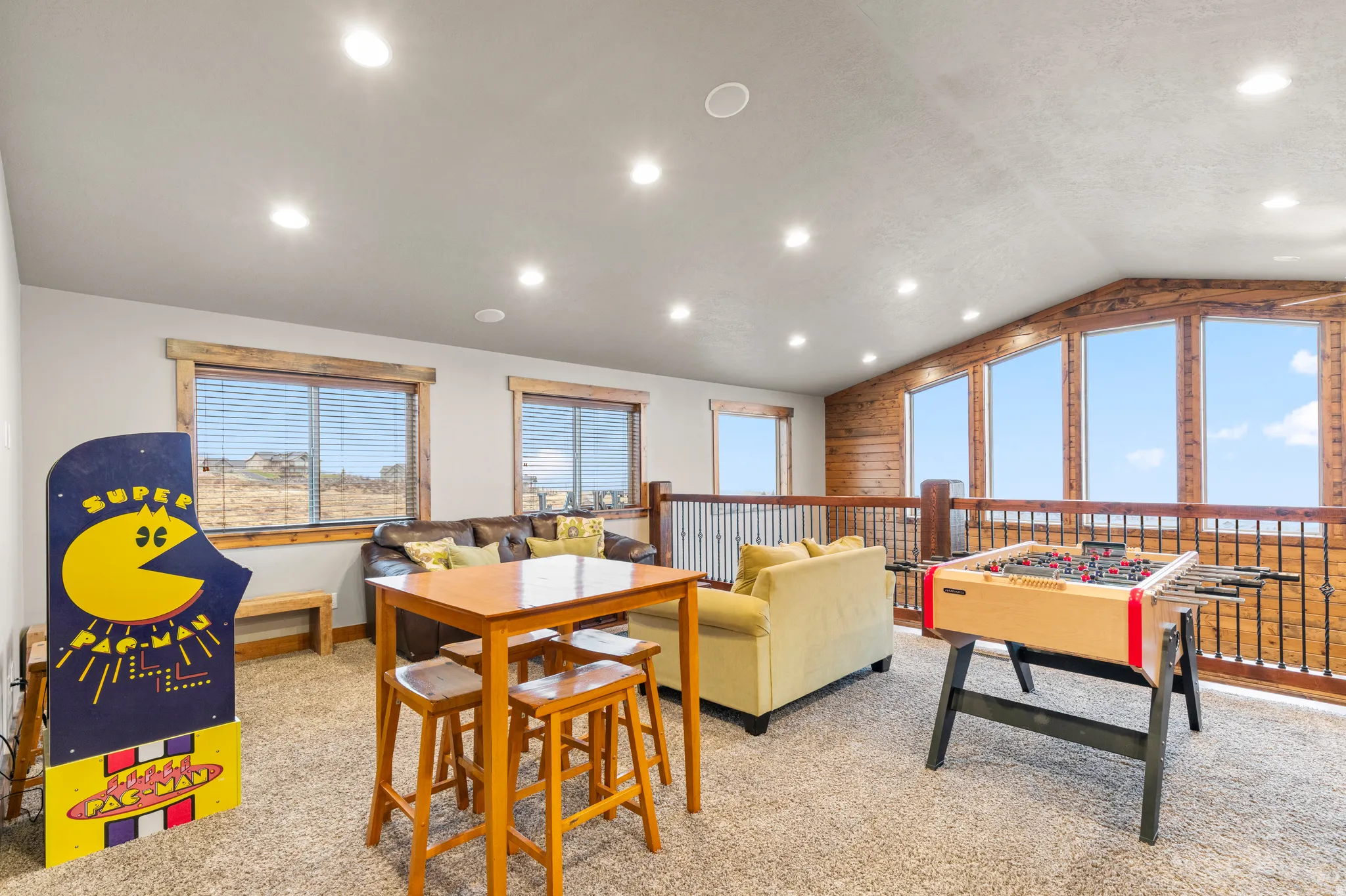 Game room with carpet floors, lofted ceiling, and recessed lighting