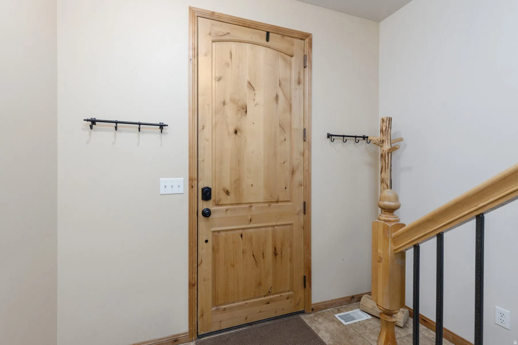 Entrance foyer with baseboards