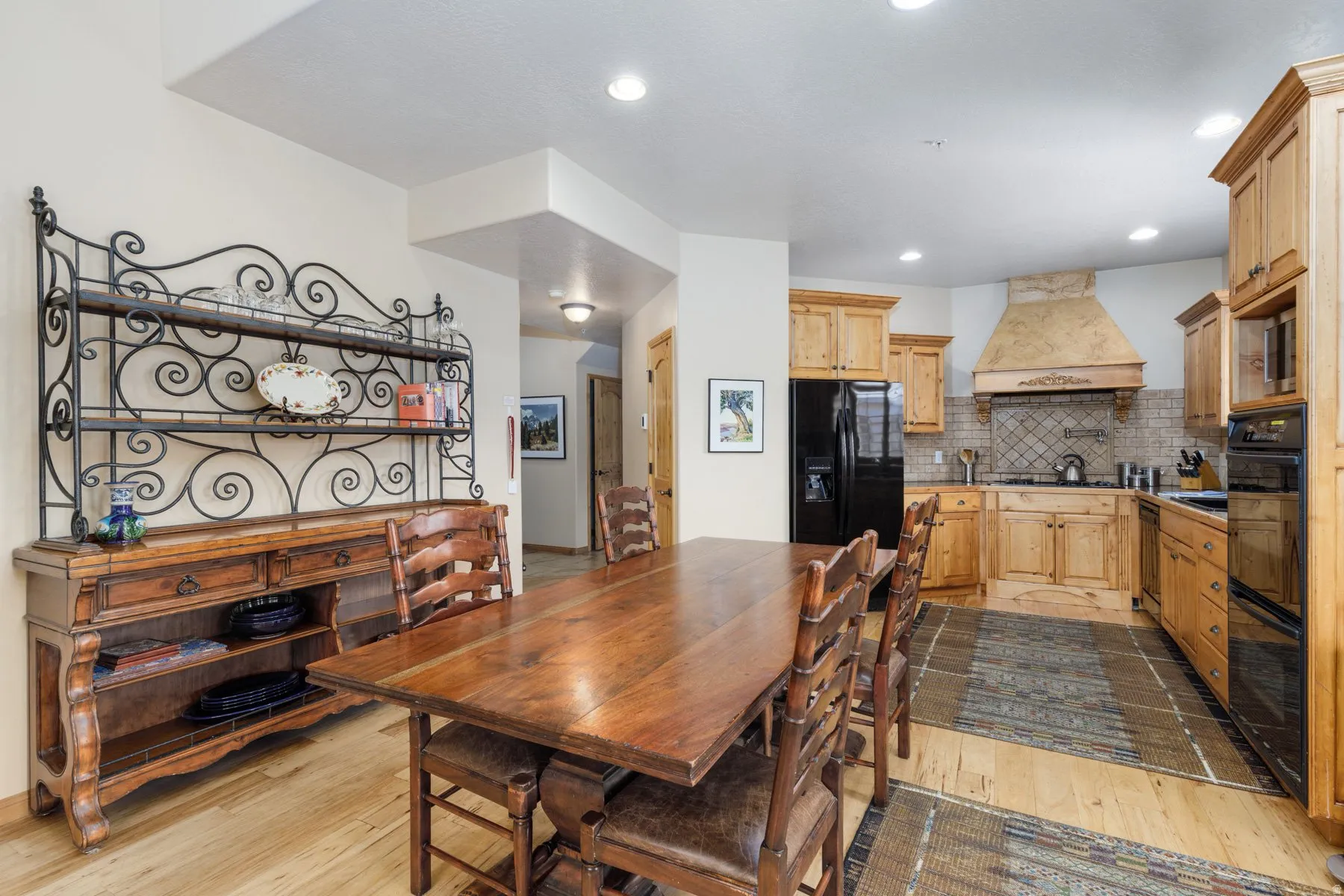 Dining space featuring light wood-style floors and recessed lighting