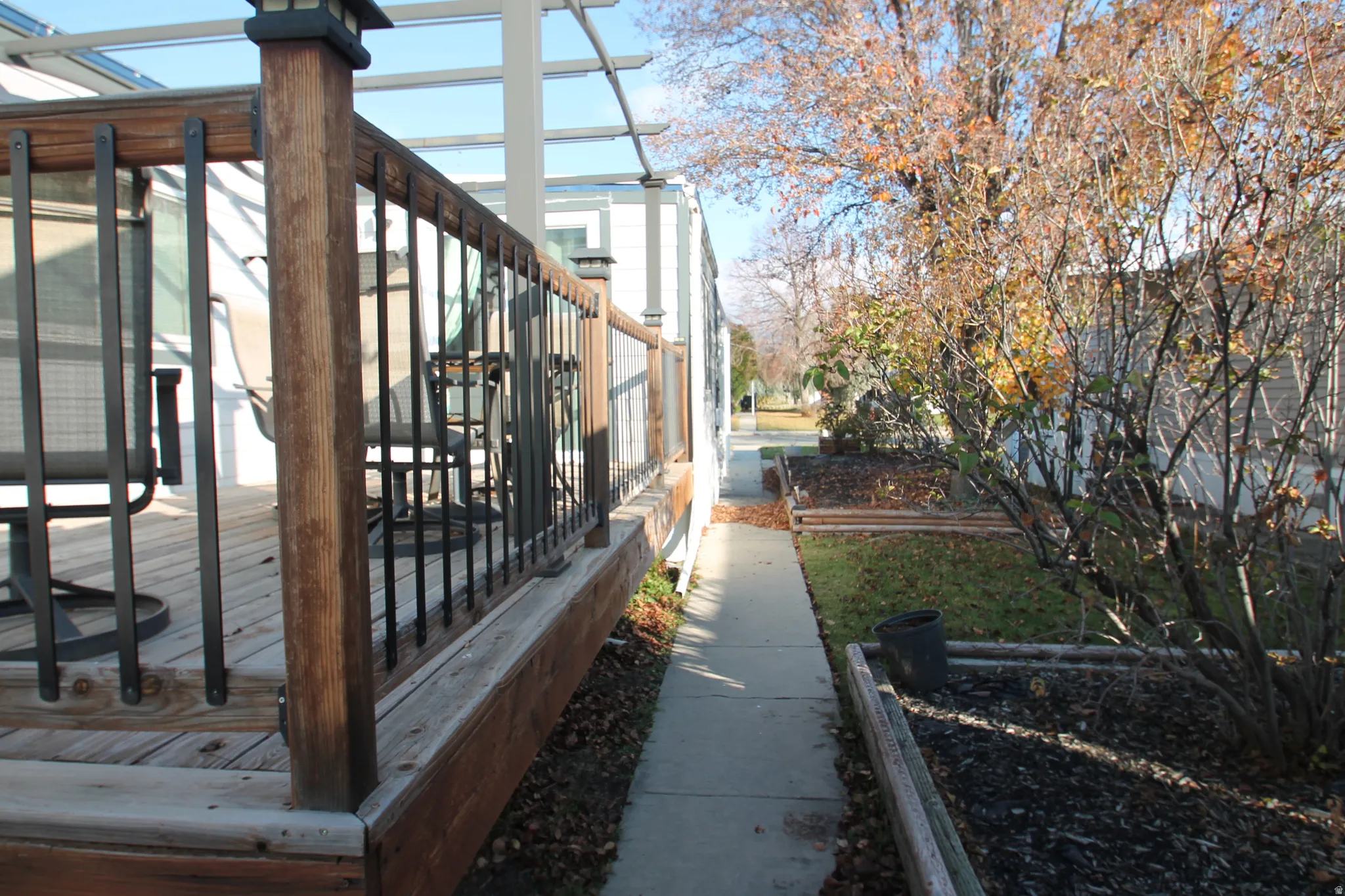 View of yard featuring a wooden deck