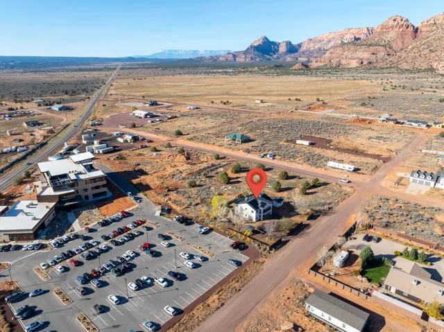 Aerial overview of property's location with mountains