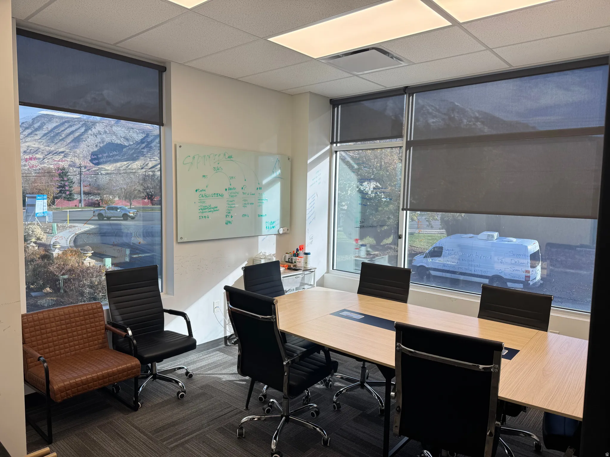 Office area featuring a paneled ceiling
