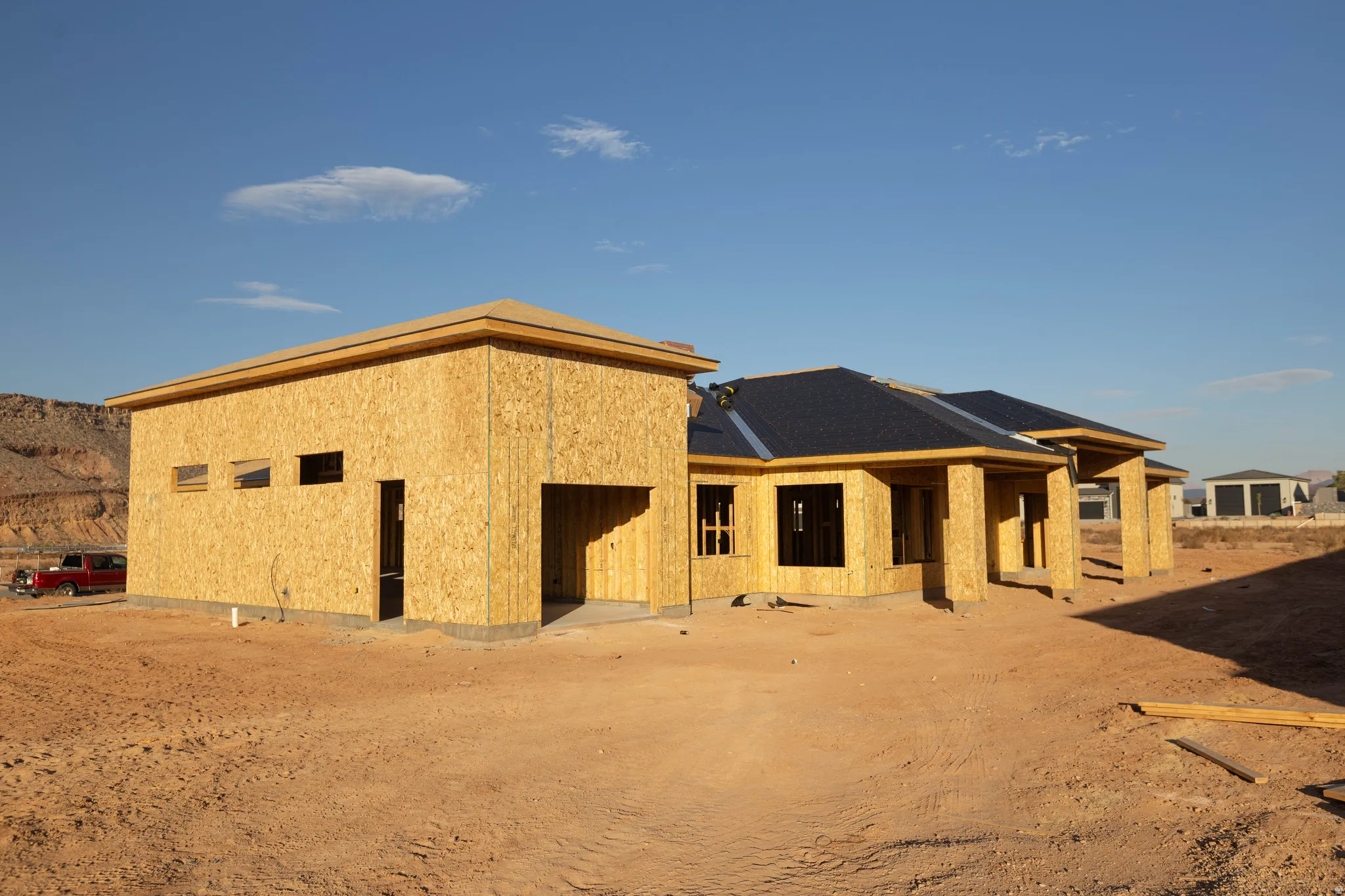 Back of house with a patio area