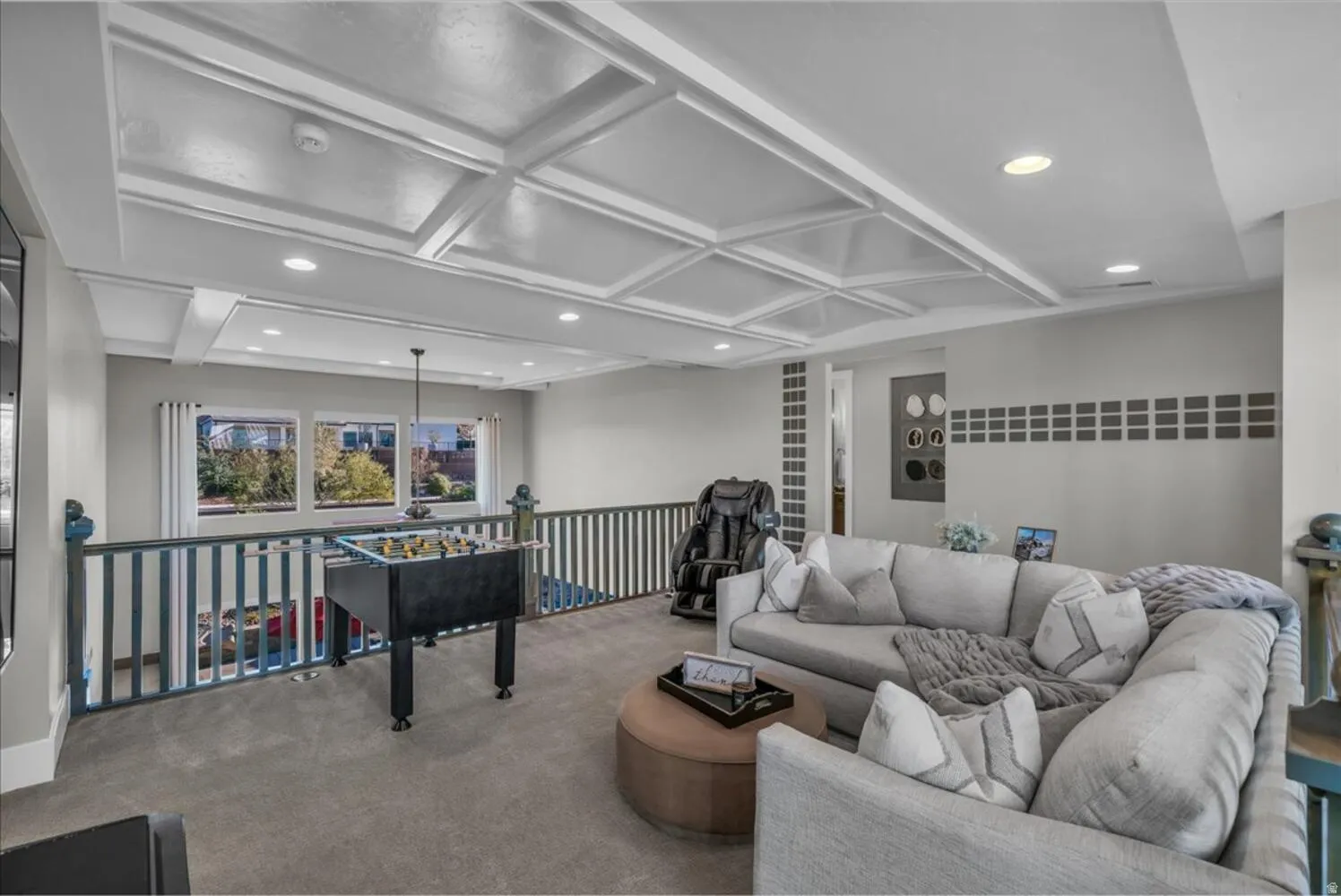 Living room featuring recessed lighting, coffered ceiling, carpet floors, and beamed ceiling