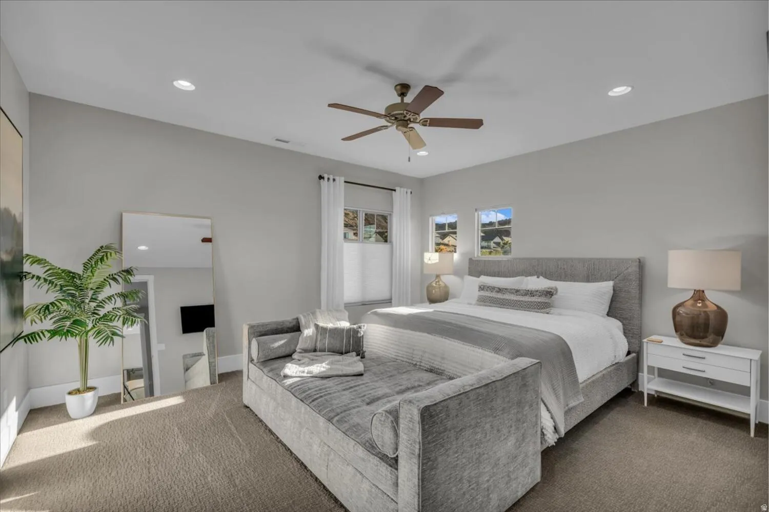 Bedroom featuring recessed lighting, carpet flooring, and a ceiling fan