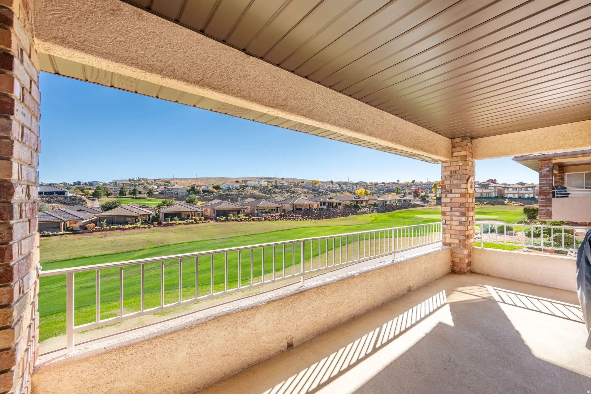 Balcony featuring a residential view
