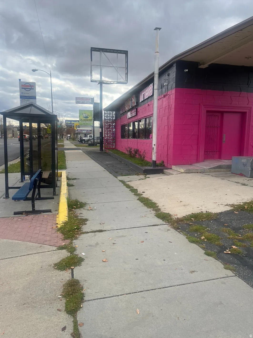 View of property exterior with concrete block siding