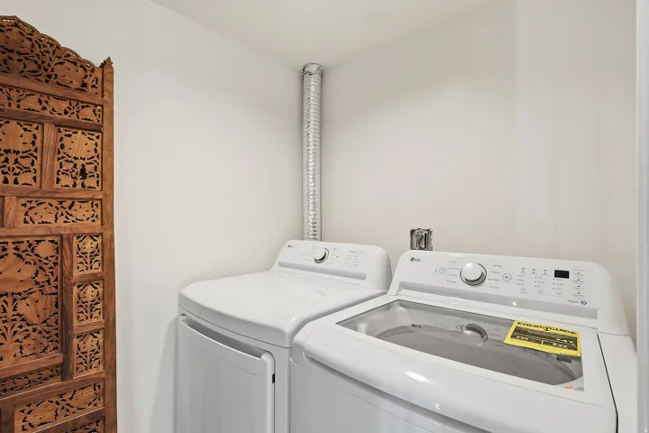 Laundry area featuring washing machine and dryer