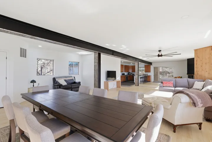 Dining room featuring light wood-style flooring and ceiling fan