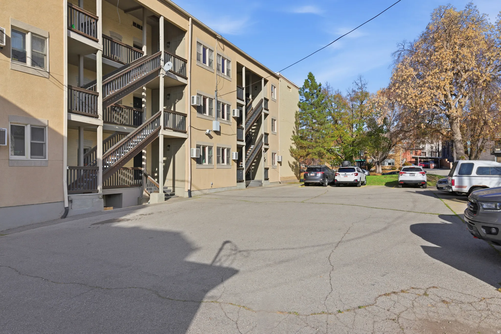 View of apartment building / complex featuring stairway