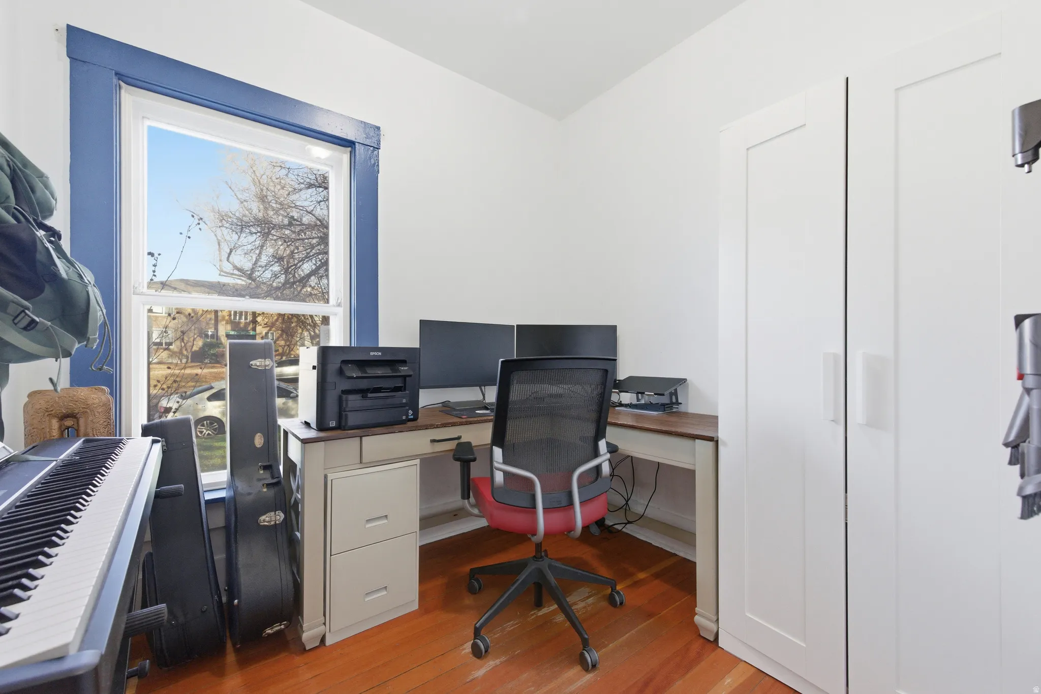 Office space featuring light wood-style flooring