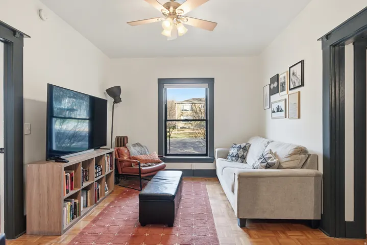 Living area featuring ceiling fan