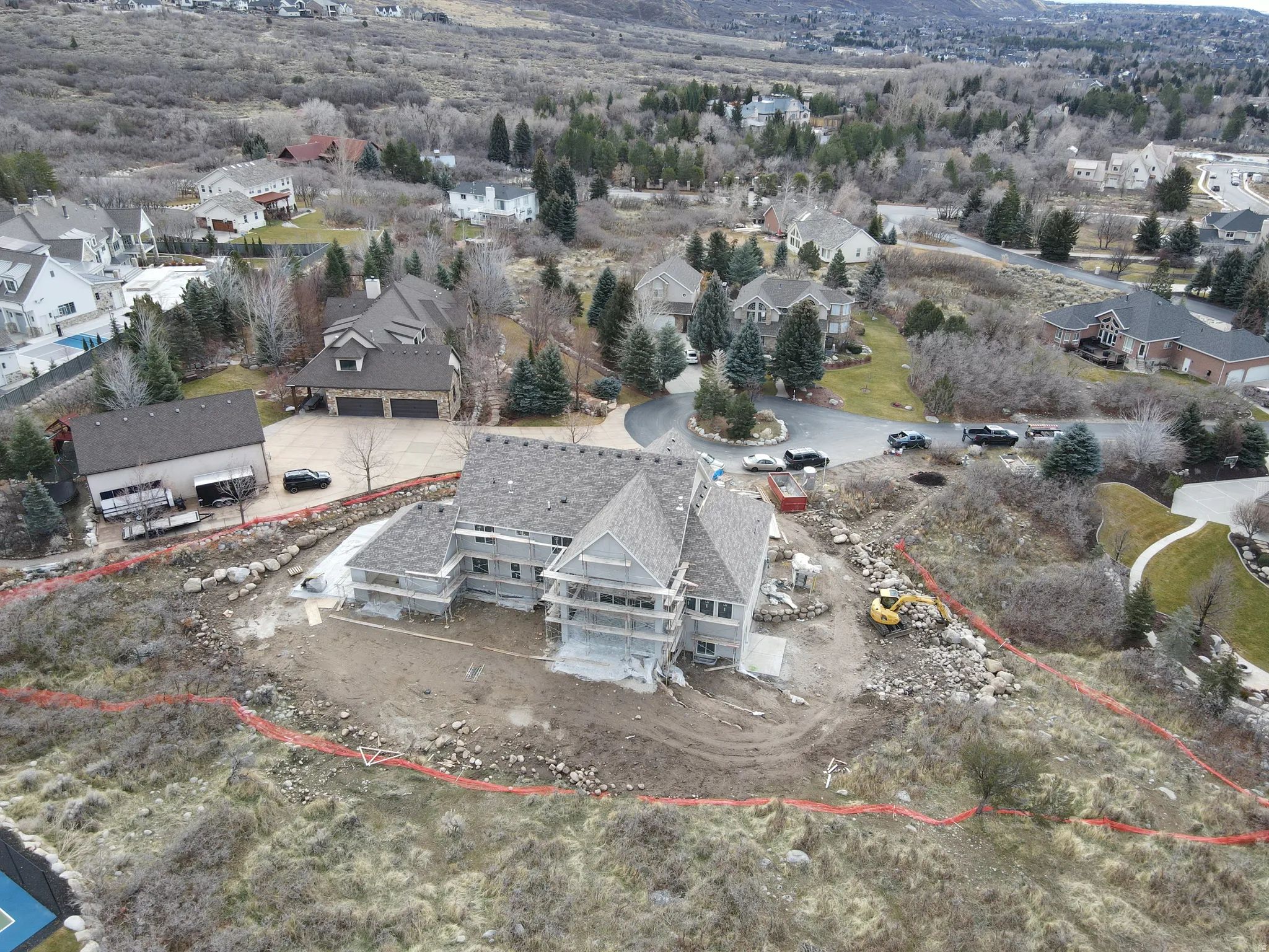 Aerial view of property's location featuring nearby suburban area