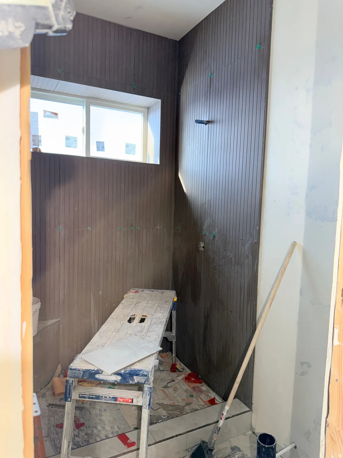 Miscellaneous room with wooden walls