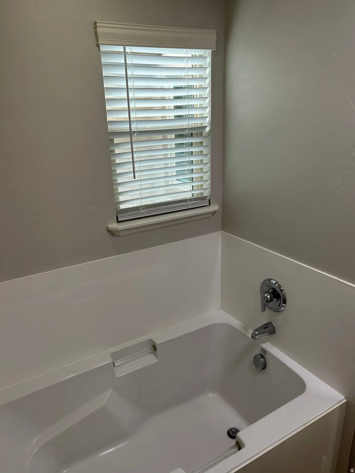 Full bath with a bath