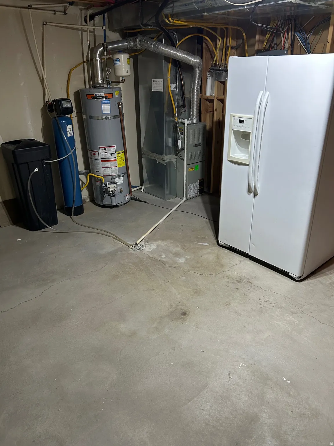 furnace, water heater, & water softener. nice refrigerator  stays
