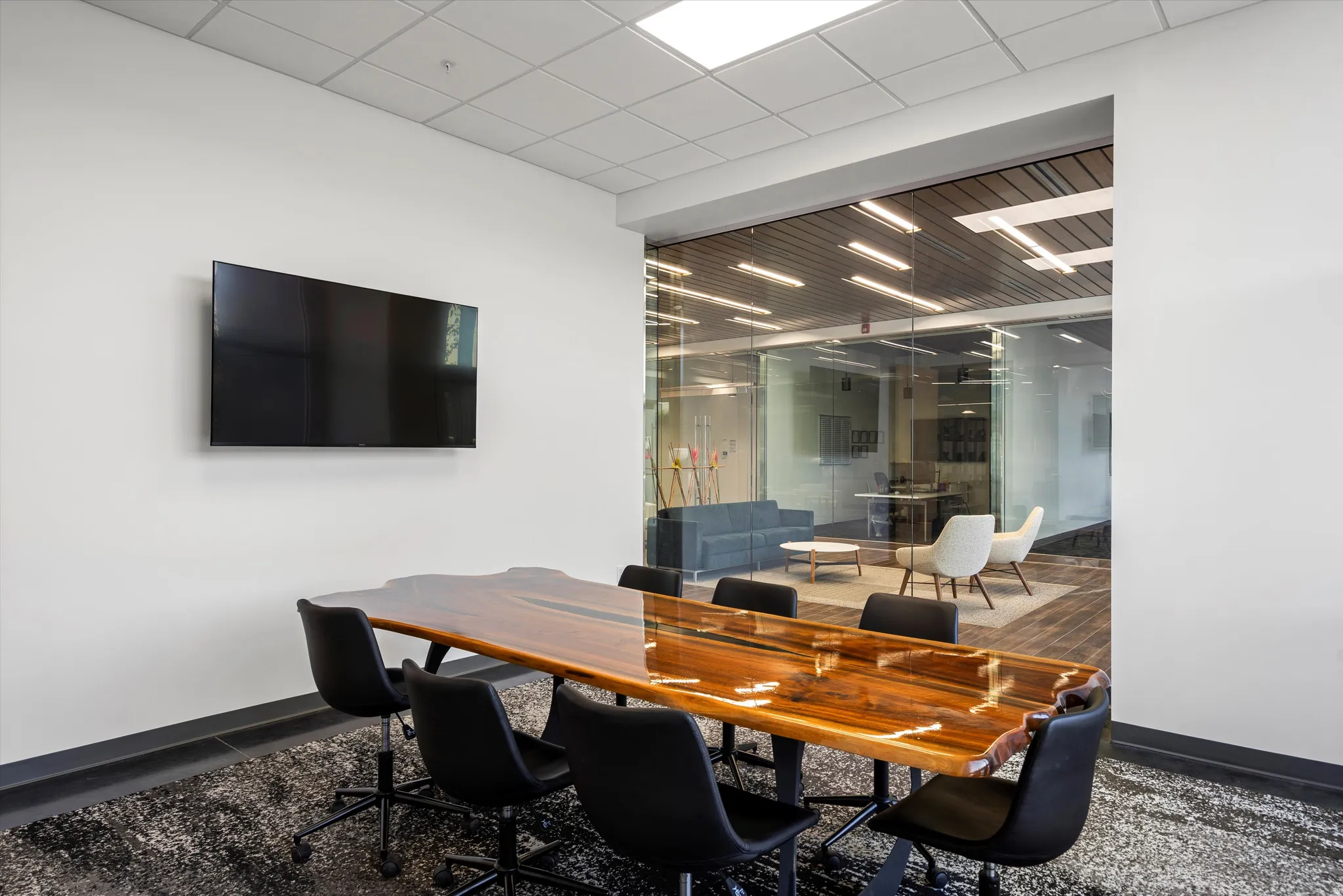 Conference room featuring a drop ceiling