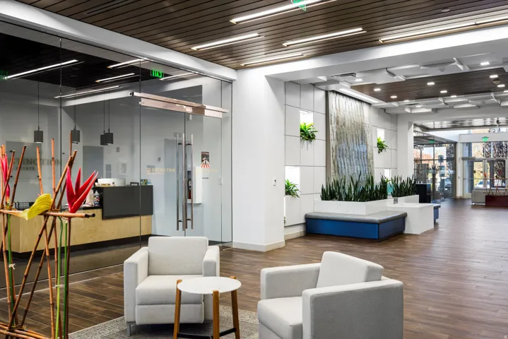 Lobby with a towering ceiling and wooden ceiling