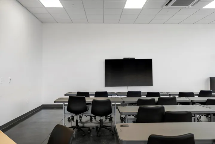 Office space with a paneled ceiling