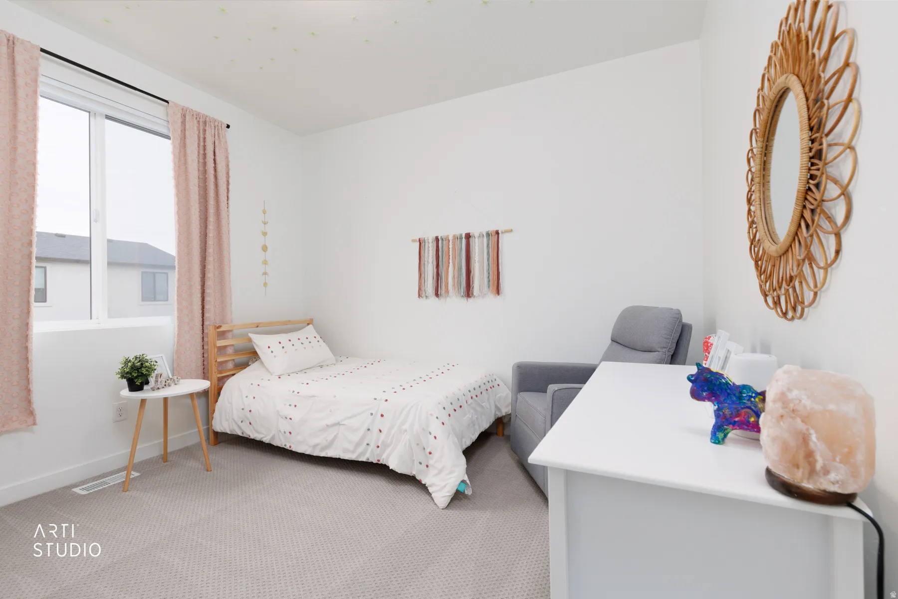 Carpeted bedroom with baseboards