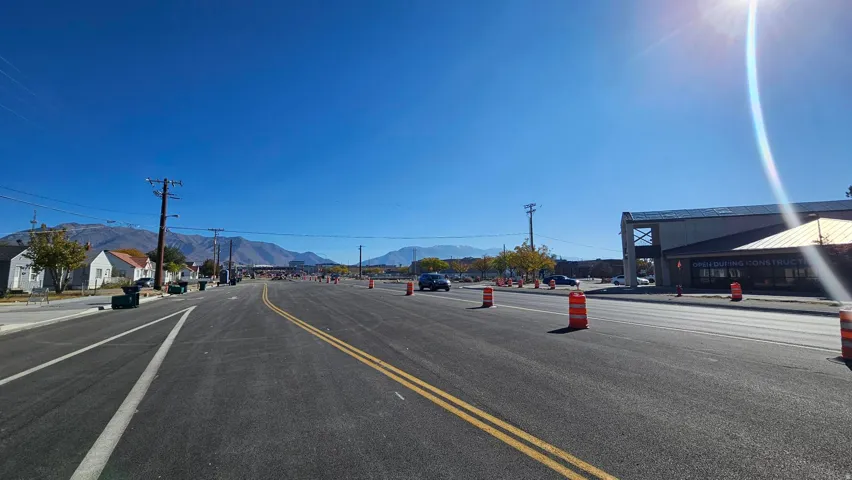 View of asphalt street with a mountain view