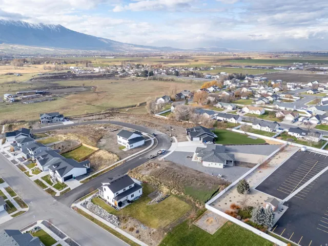 View of property location with nearby suburban area and a mountainous background