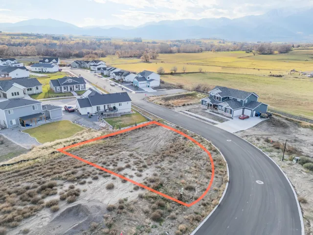 Aerial view of residential area with a mountain backdrop