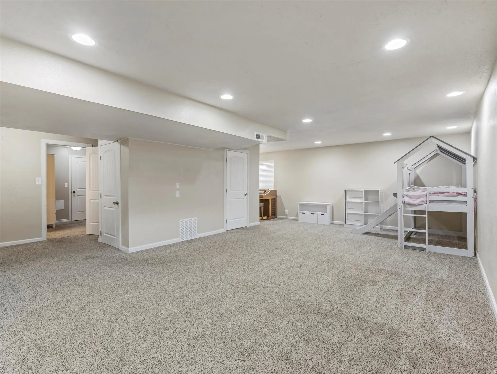 Large basement bedroom with walk-in closet
