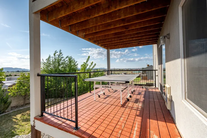 Wooden deck featuring a mountain view