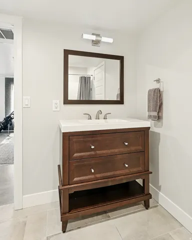 Bathroom with vanity and a shower with curtain