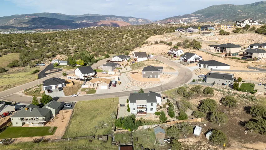 View of property location with nearby suburban area and a mountain backdrop