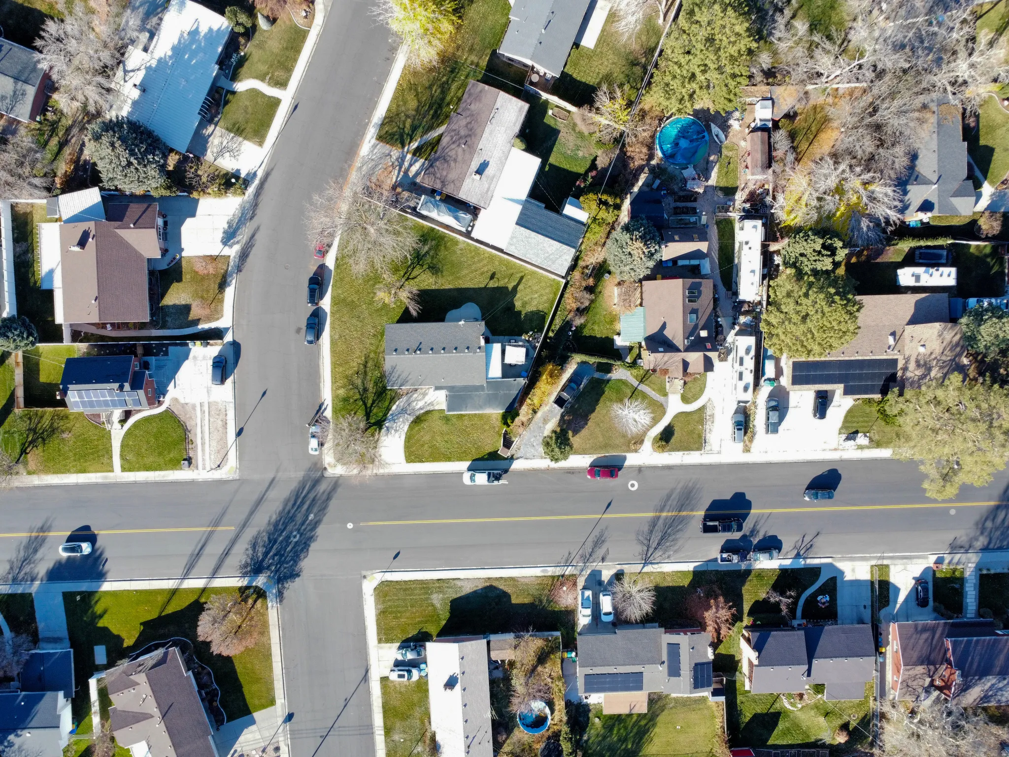 Aerial view of property's location with nearby suburban area