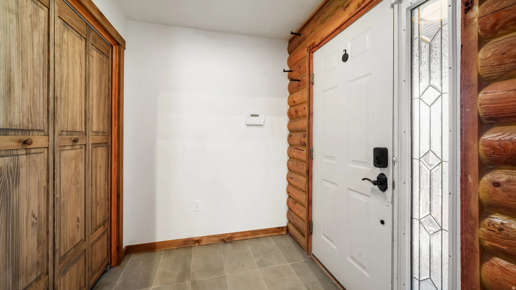 Entrance foyer with baseboards