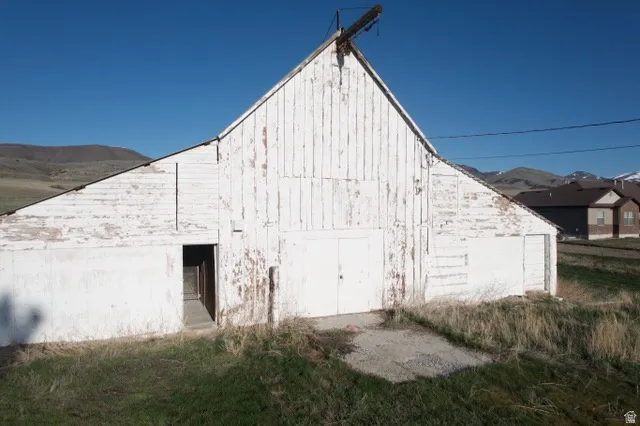 View of barn featuring a mountain view