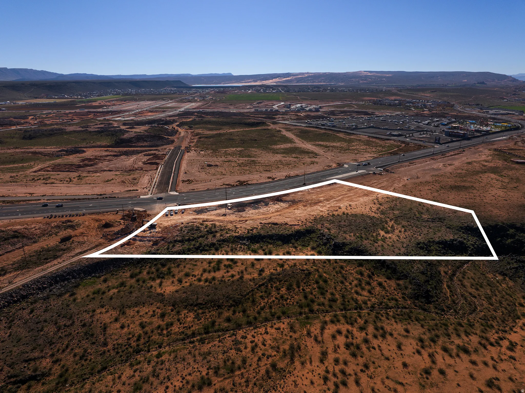 Overview of rural landscape with mountains and property boundaries highlighted