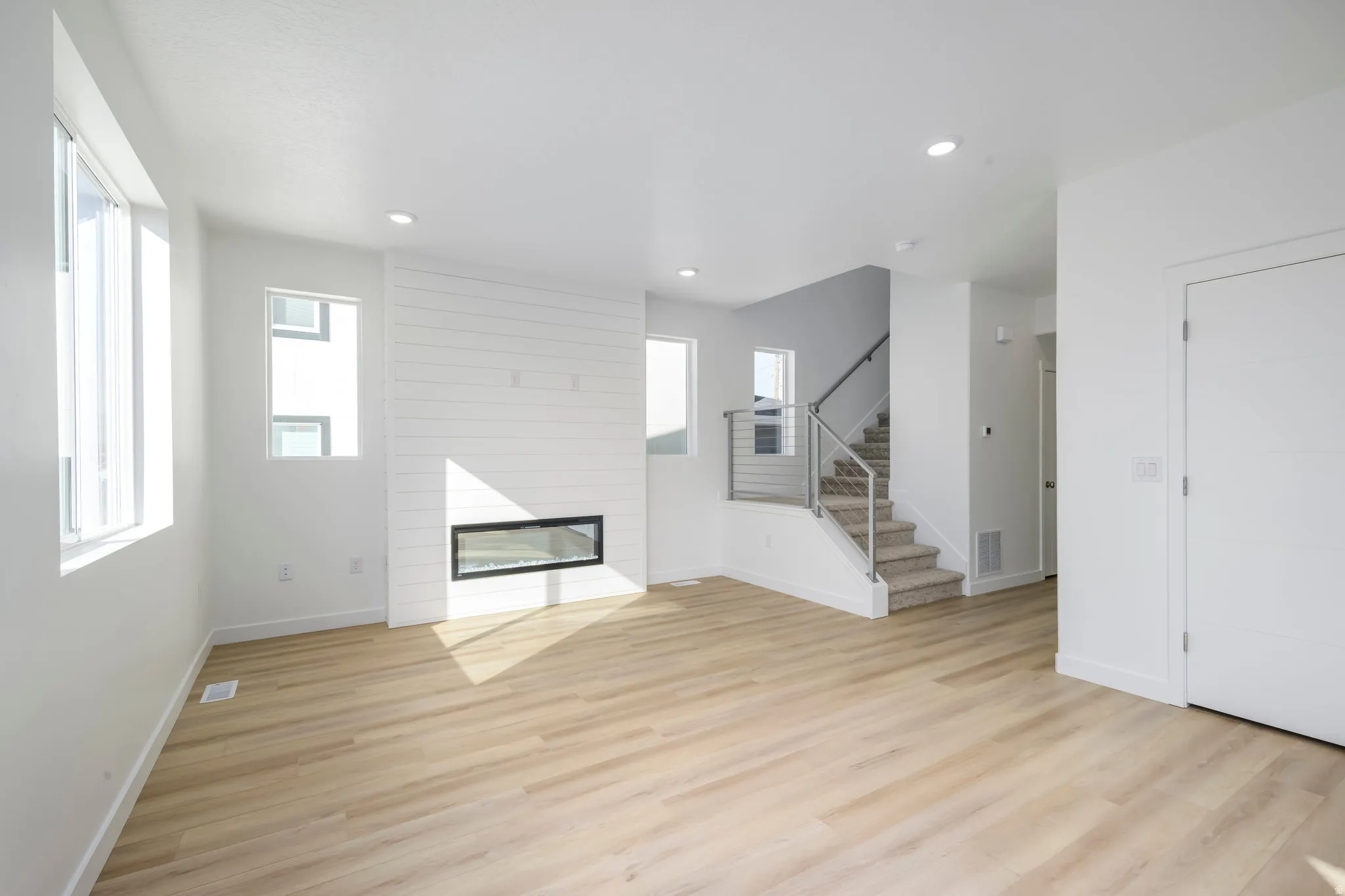 Bright by day, cozy by night-this living room is ready for anything from lazy Sundays to lively get-togethers.
