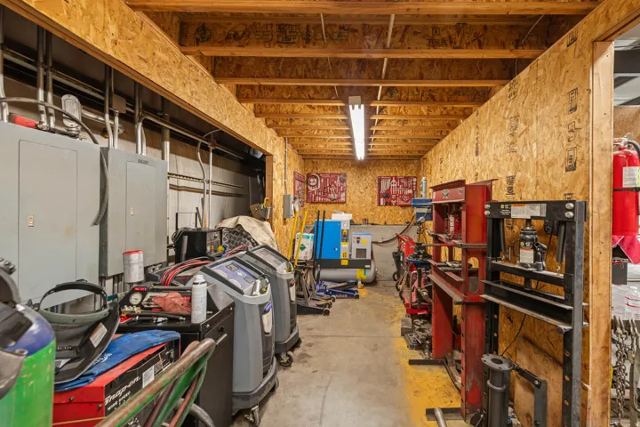Garage featuring electric panel