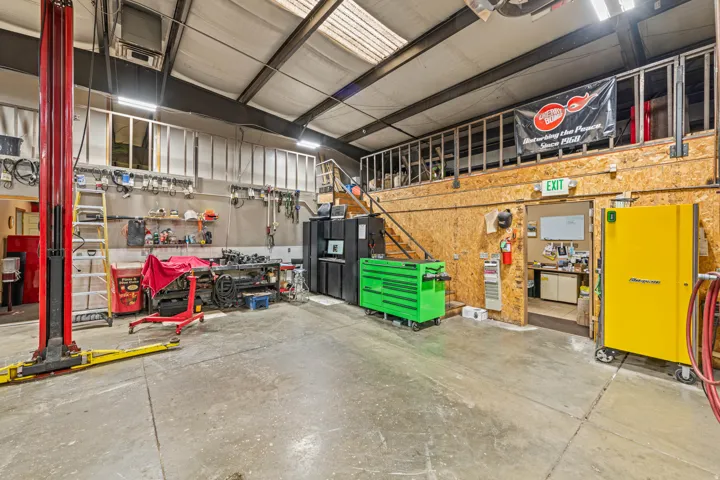 Garage featuring a workshop area
