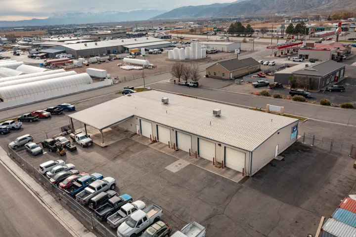 Aerial view of an industrial area and a mountain backdrop