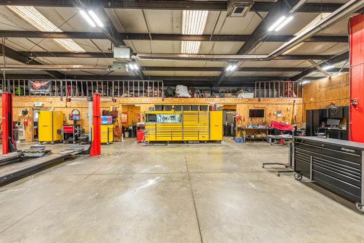 Garage featuring a workshop area