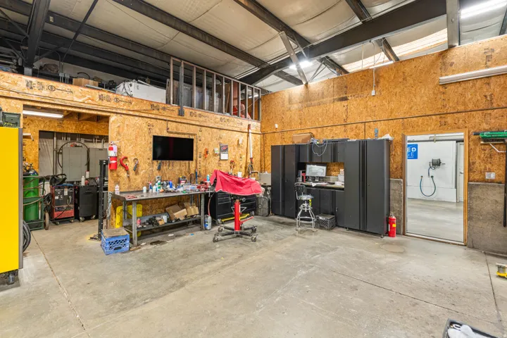 Garage featuring a workshop area