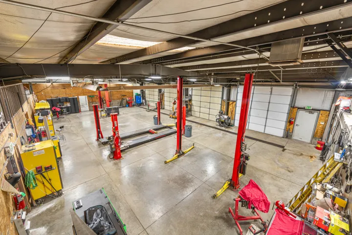 Below grade area featuring a garage and a workshop area