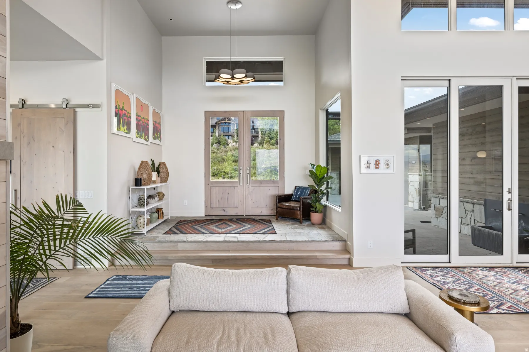 Doorway to property with french doors and an outdoor living space