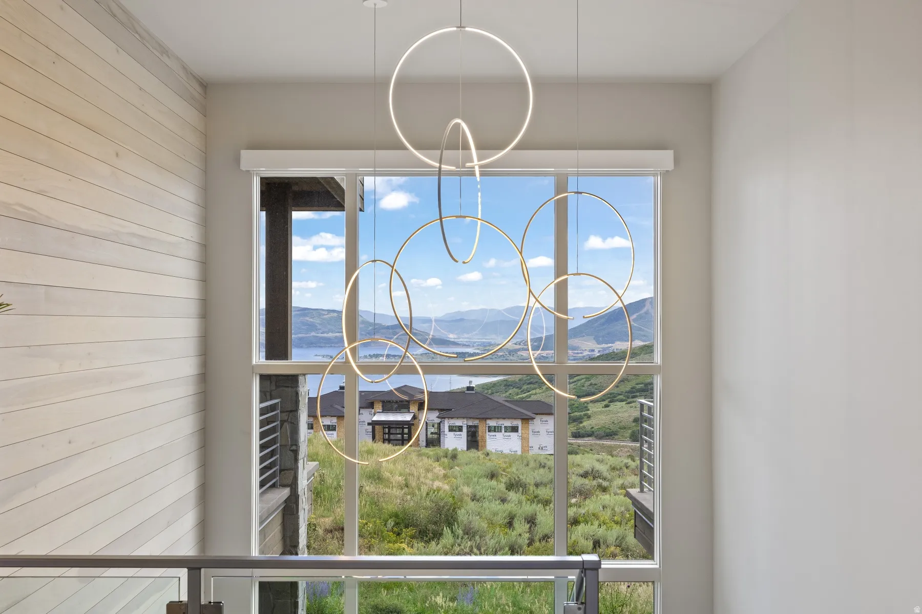 Detailed view of a chandelier and a mountain backdrop