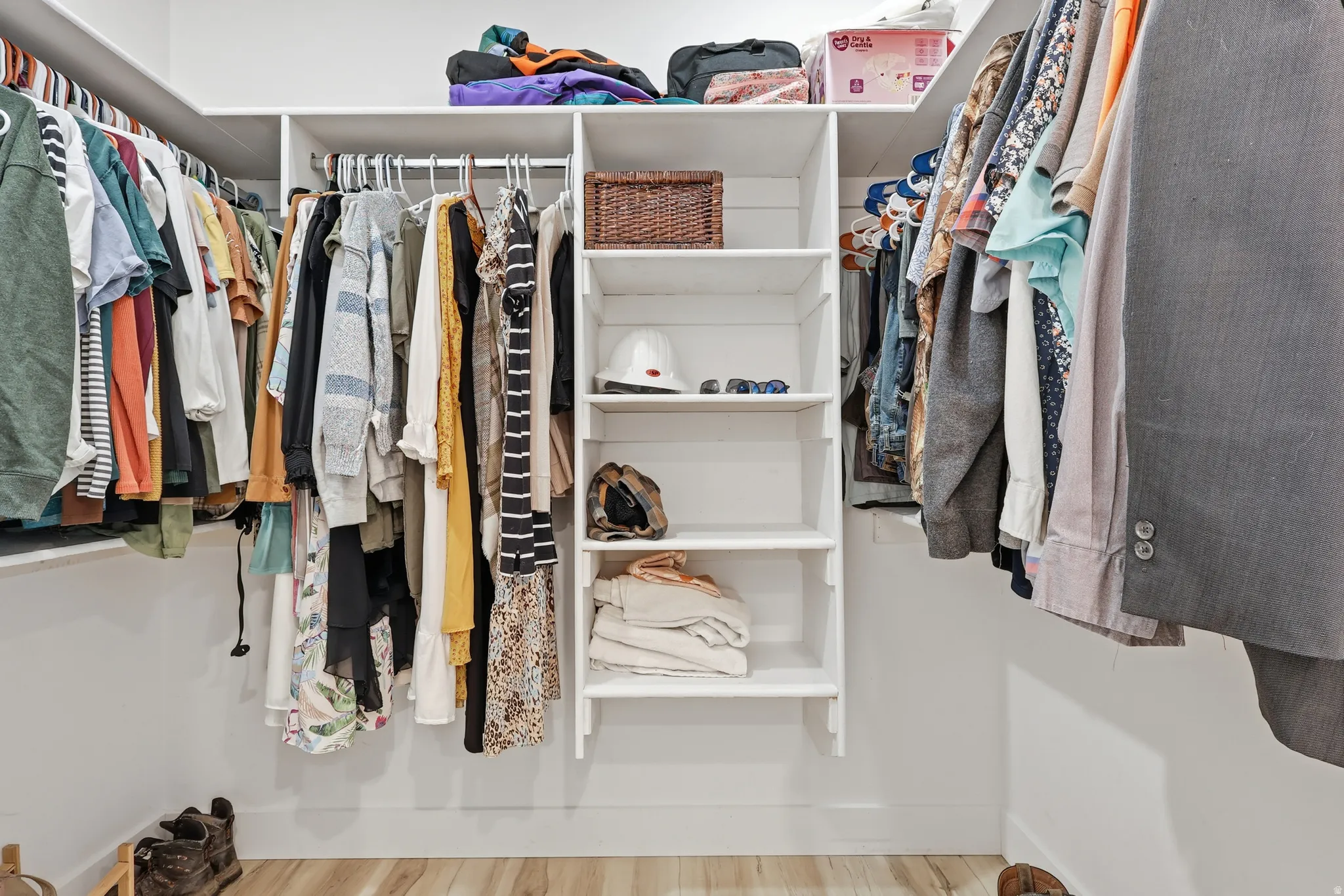 Spacious closet with light wood-type flooring