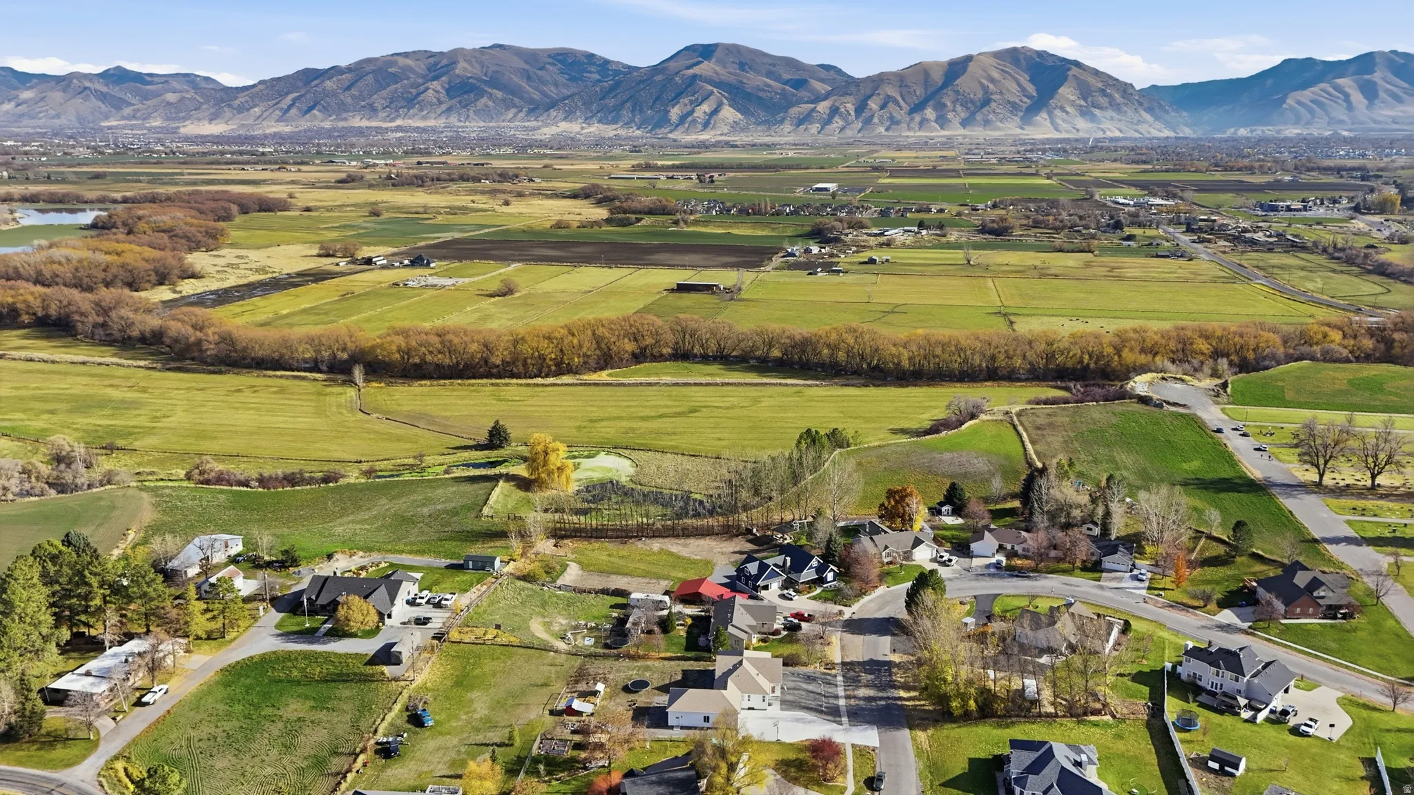 View of property location with a water and mountain view