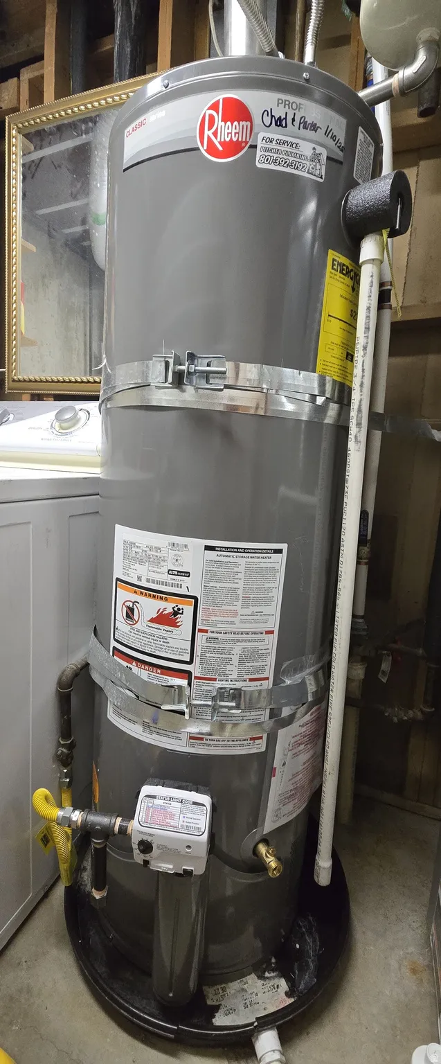 Utilities featuring secured water heater and washer / dryer