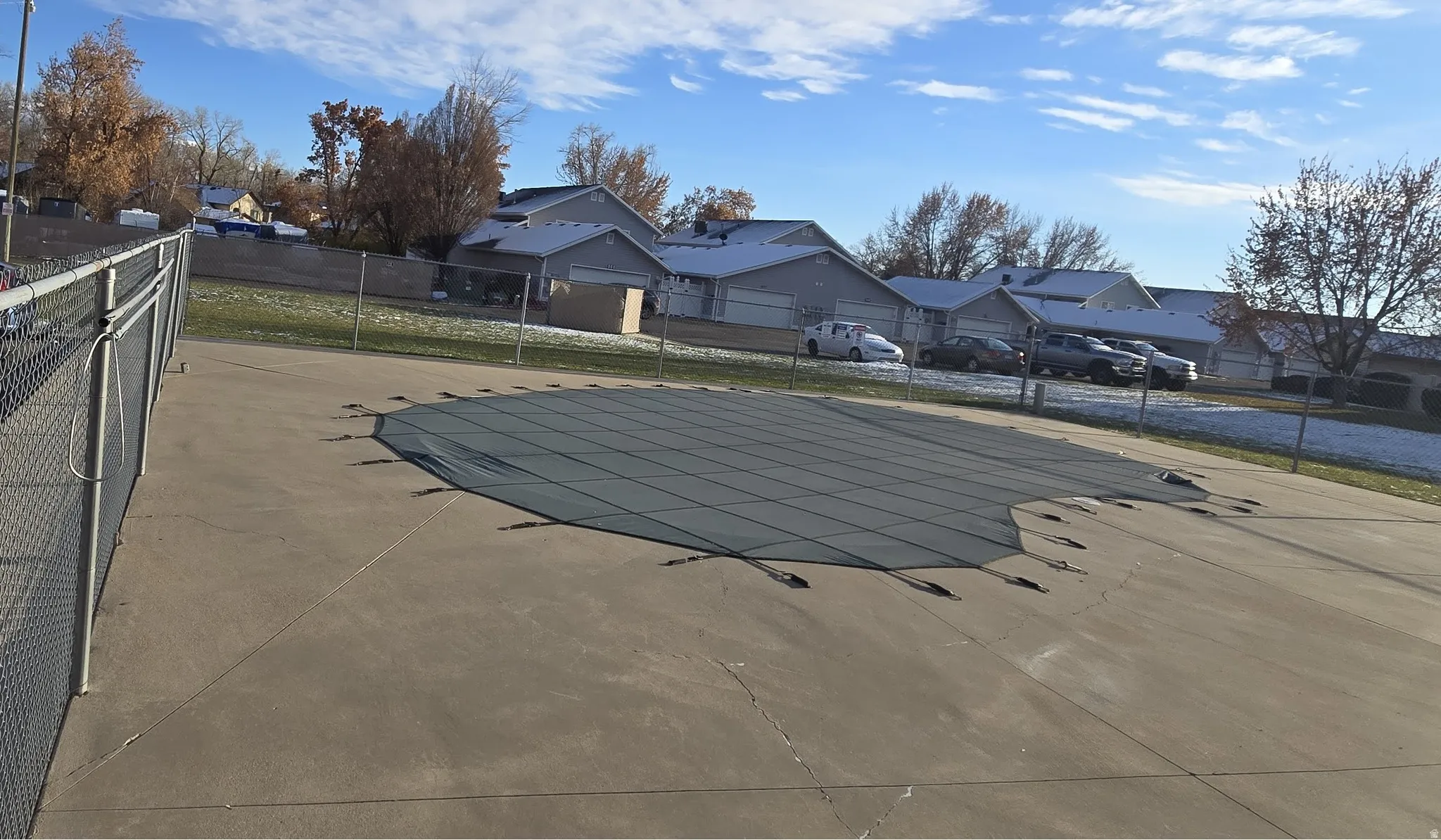 View of swimming pool with a residential view